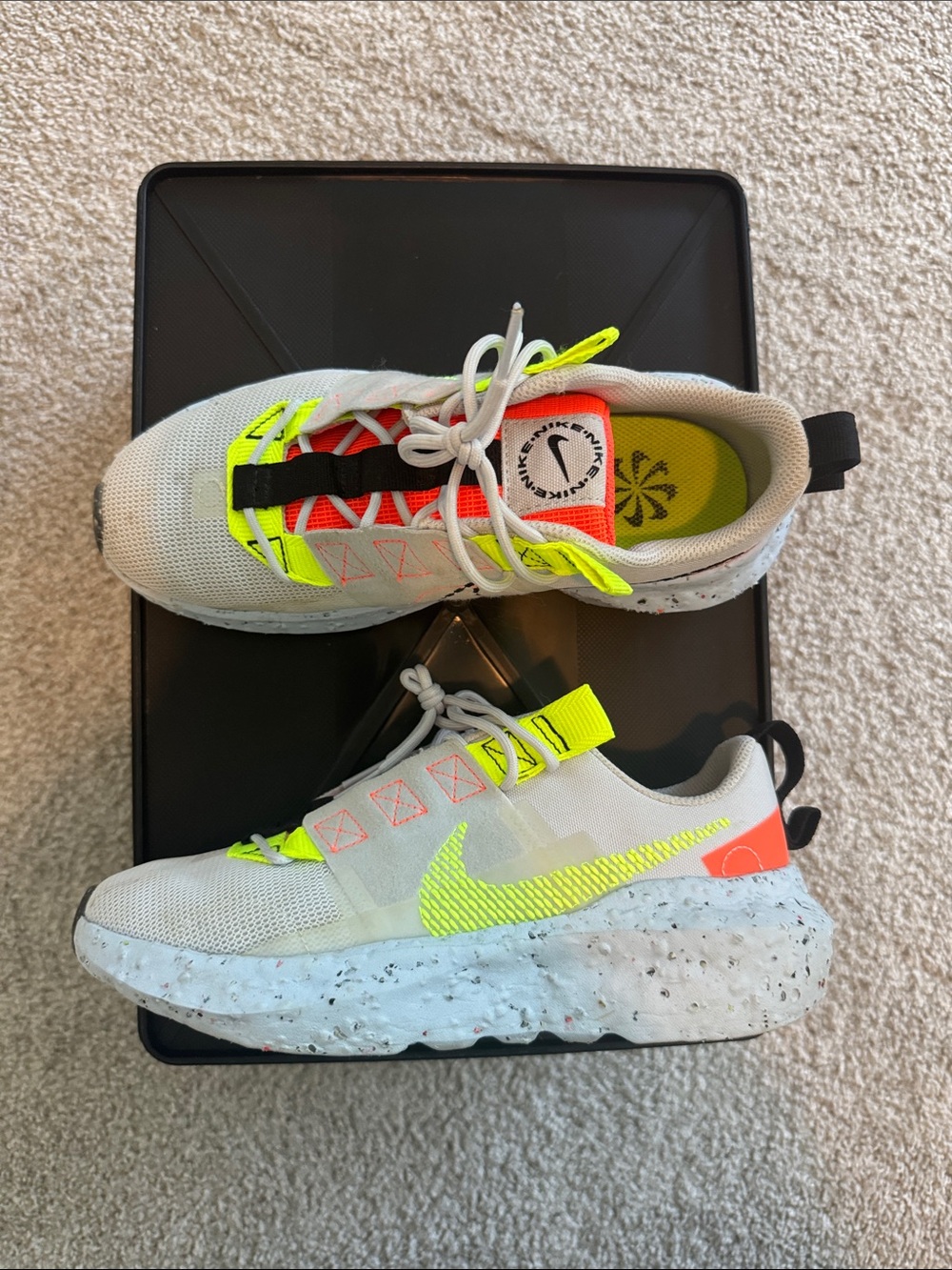 Nike Women’s Sneaker in Light Blue with Neon Yellow and Orange Accents